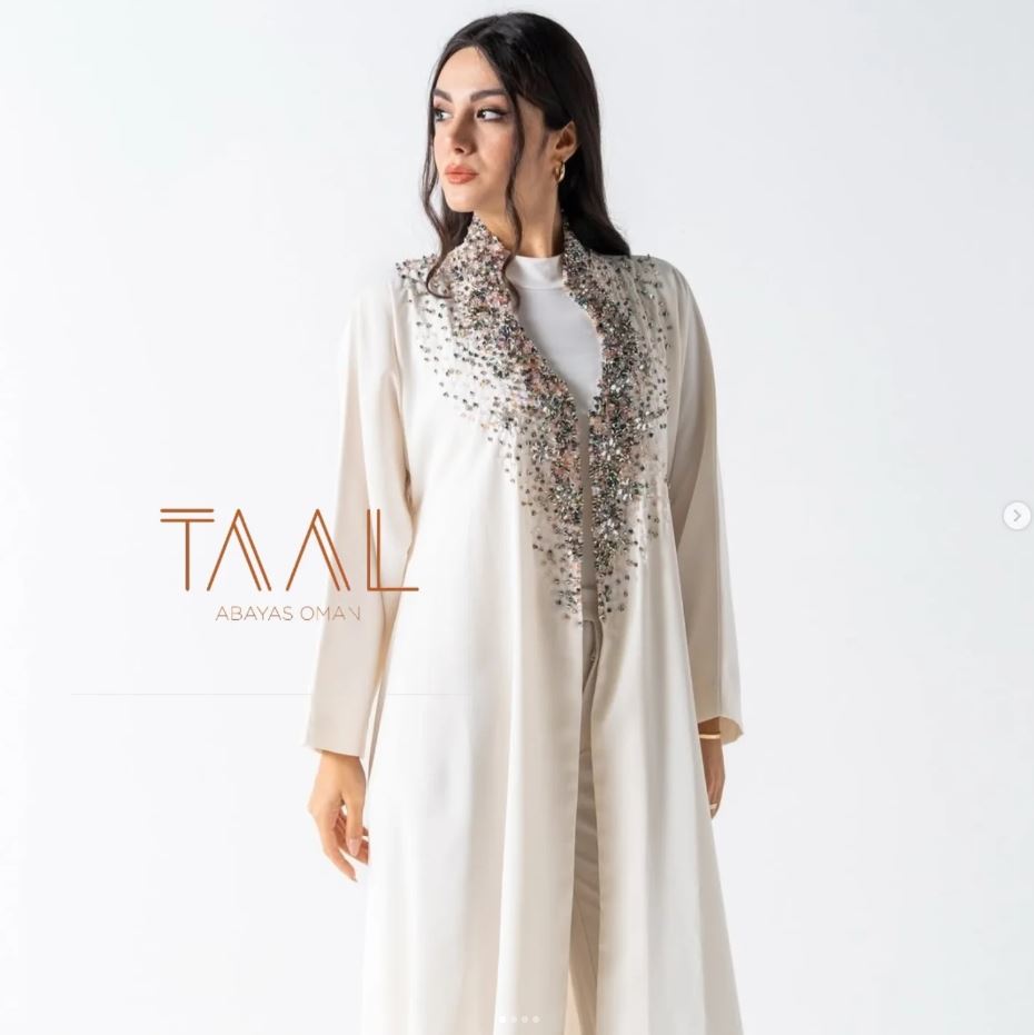 Cream beaded and crystal-embellished abaya, TAAL editorial shot